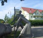 Karpfen am Illmensee - Denkmal der Glockensage mit Blick auf unser Gästehaus